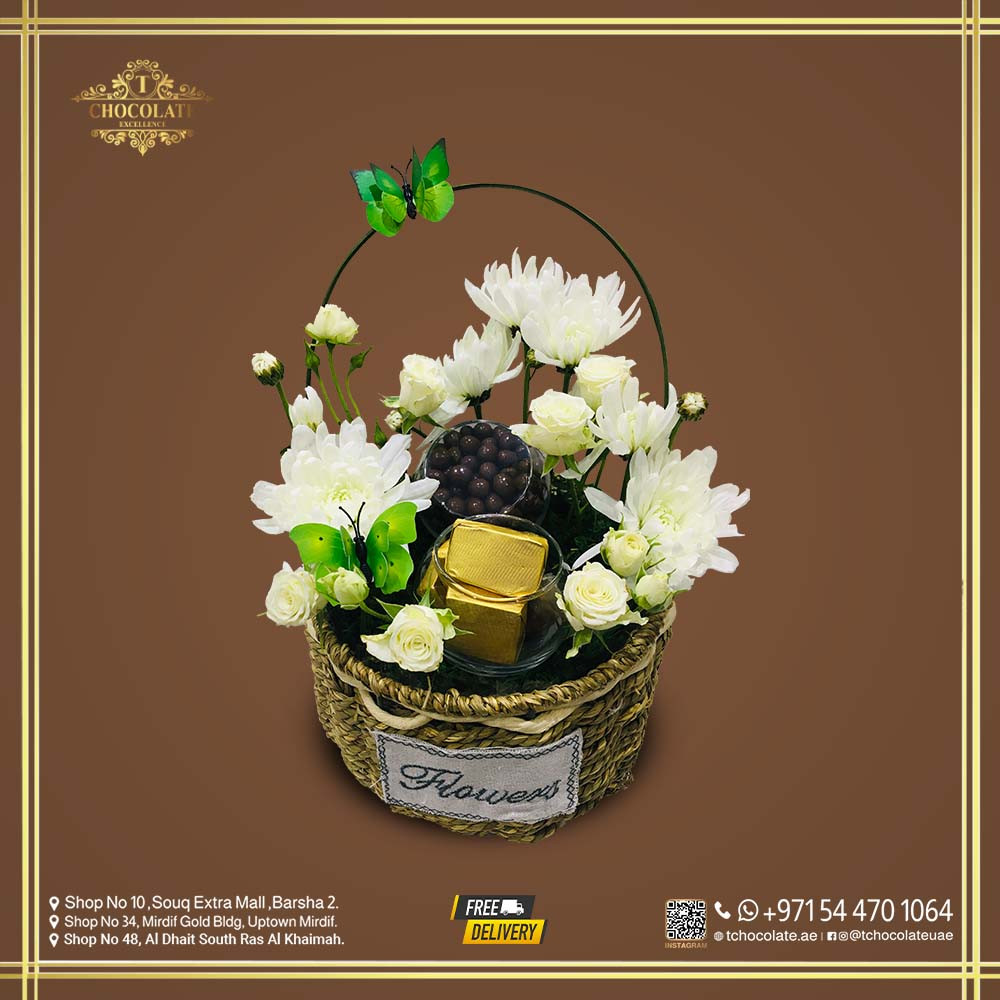 Small Basket With Fresh Flower And Chocolate